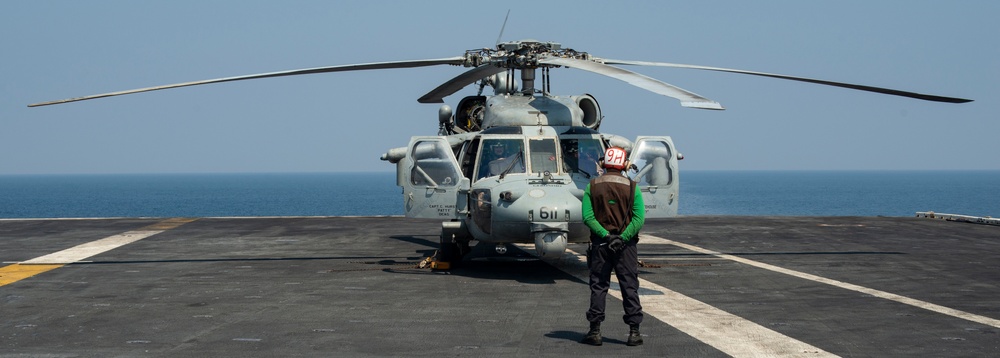 Helicopter Sits on Flight Deck