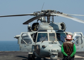 Helicopter Sits on Flight Deck