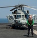 Helicopter Sits on Flight Deck