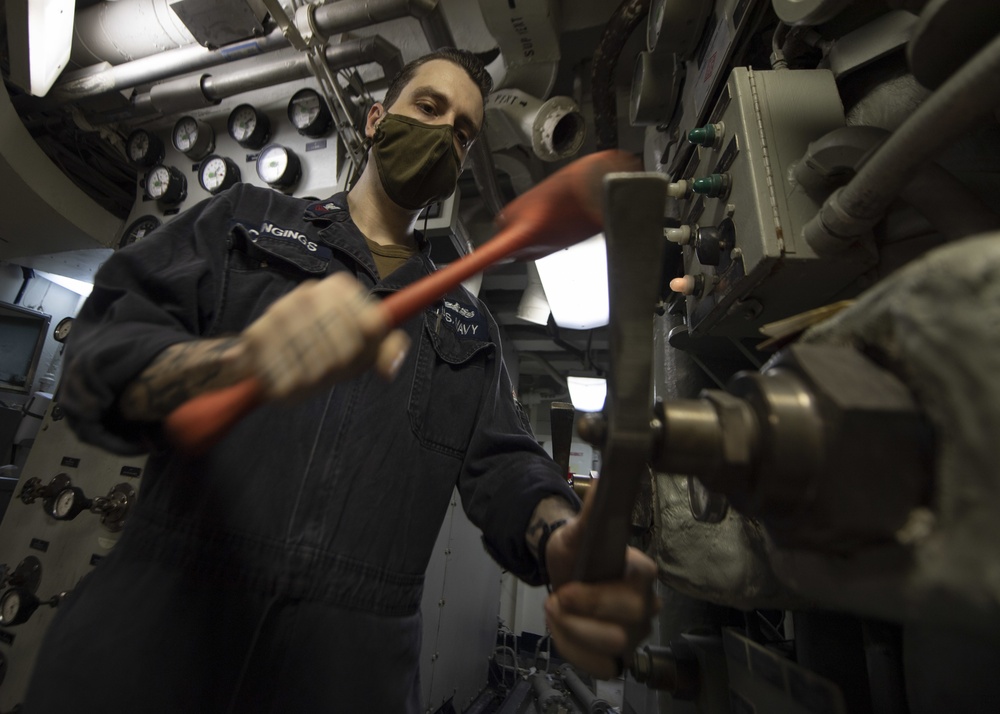 Sailor Adjusts Air Purification Unit Valve