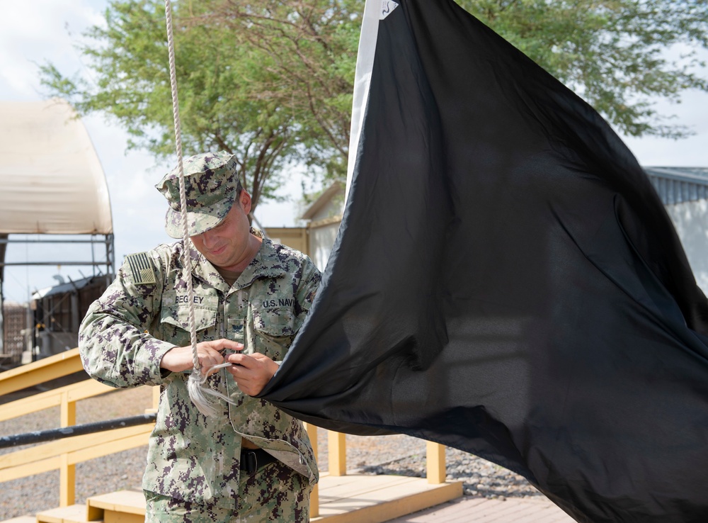 Camp Lemonnier Sailor Hoists Weather Conditions Flag