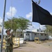 Camp Lemonnier Sailor Hoists Weather Conditions Flag