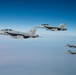 A U.S. Air Force KC-135 Stratotanker refuels F-18s
