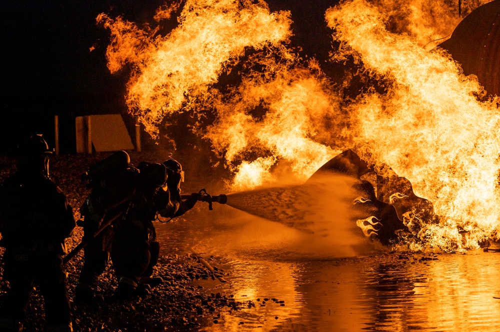 Collaboration builds camaraderie: Total Force, community firefighters train at Dover