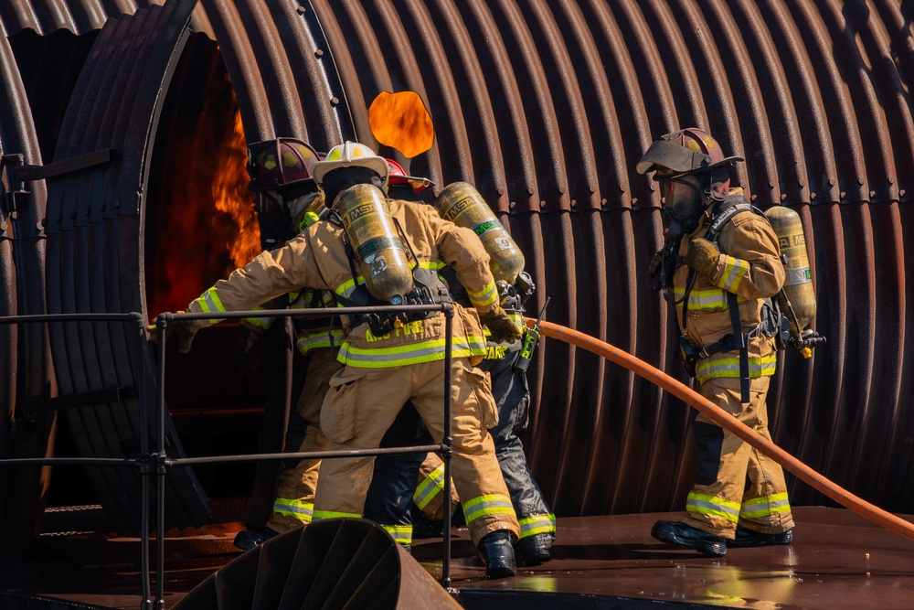 Collaboration builds comradery: Total Force, community firefighters train at Dover