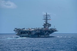 USS Ronald Reagan Conducts A Replenishment-at-sea