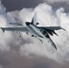 A U.S. Air Force KC-135 Stratotanker refuels a Navy F/A-18 Super Hornet