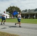 Airmen show support for former wingman with tribute run