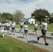 Airmen show support for former wingman with tribute run