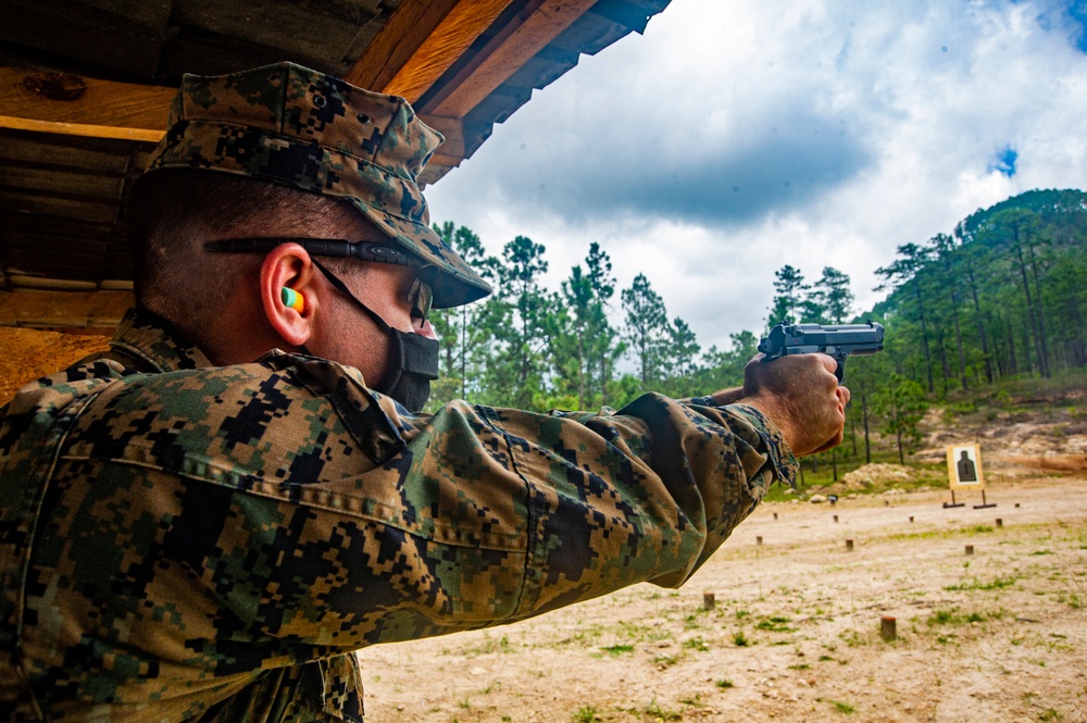 US Marines coach joint service pistol range in Honduras