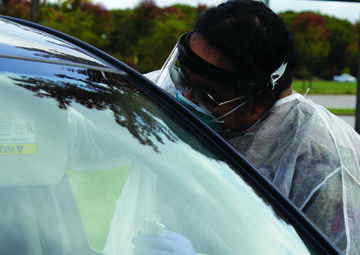 Michigan National Guard performing coronavirus tests in the fall at Bay City