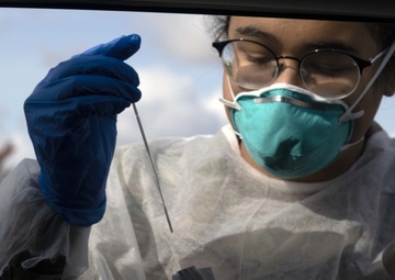 Michigan National Guard performing coronavirus tests in the fall at Bay City