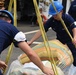 Coast Guard Cutter Bertholf members offload narcotics in San Diego