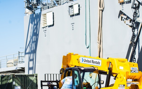 Workers Unload Equipment From LSV 5