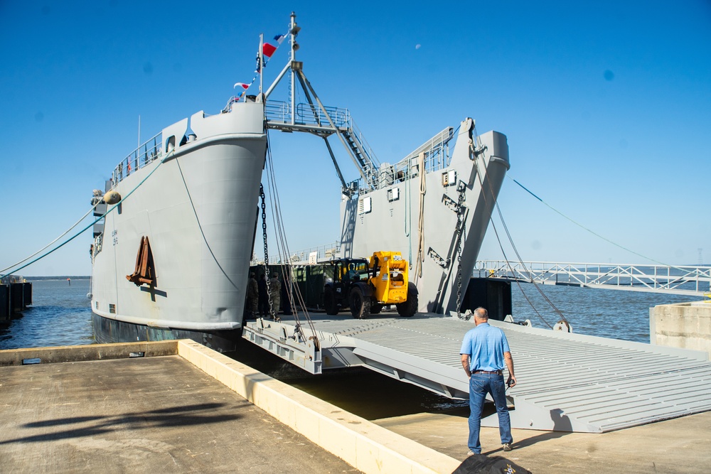 Workers Unload Equipment From LSV 5