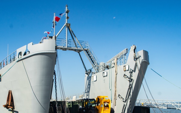 Workers Unload Equipment From LSV 5