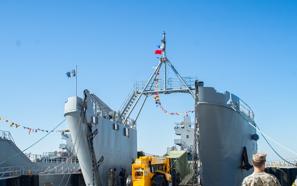 Workers Unload Equipment From LSV 5