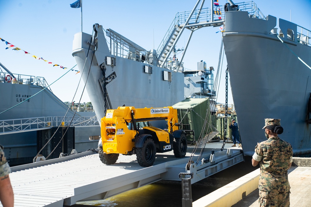 Workers Unload Equipment From LSV 5