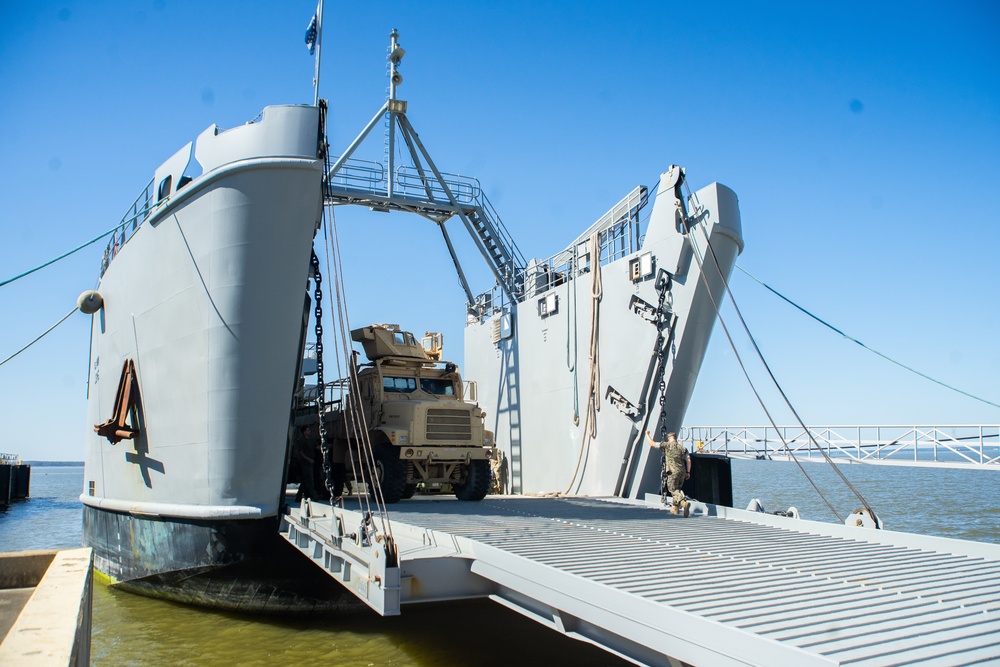 Workers Unload Equipment From LSV 5