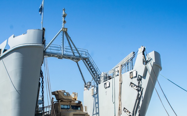 Workers Unload Equipment From LSV 5