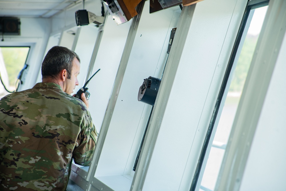 Chief Warrant Officer 4 Gary Bolser Issues Commands to the Crew of LSV 5