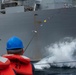 USS Halsey Conducts A Replenishment-at-sea