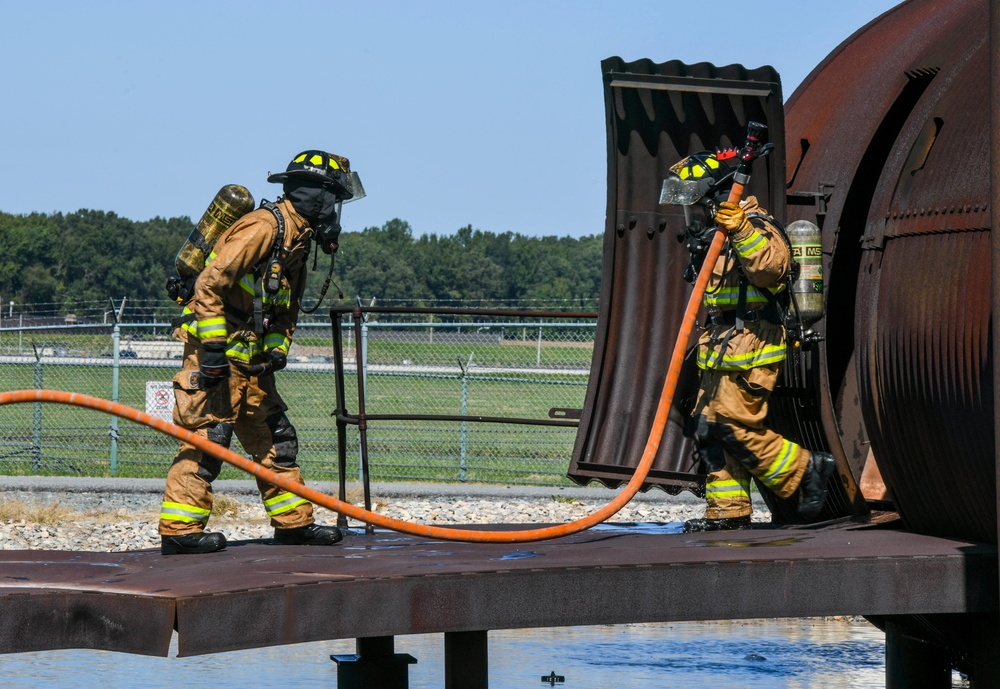 Collaboration builds comradery: Total Force, community firefighters train at Dover