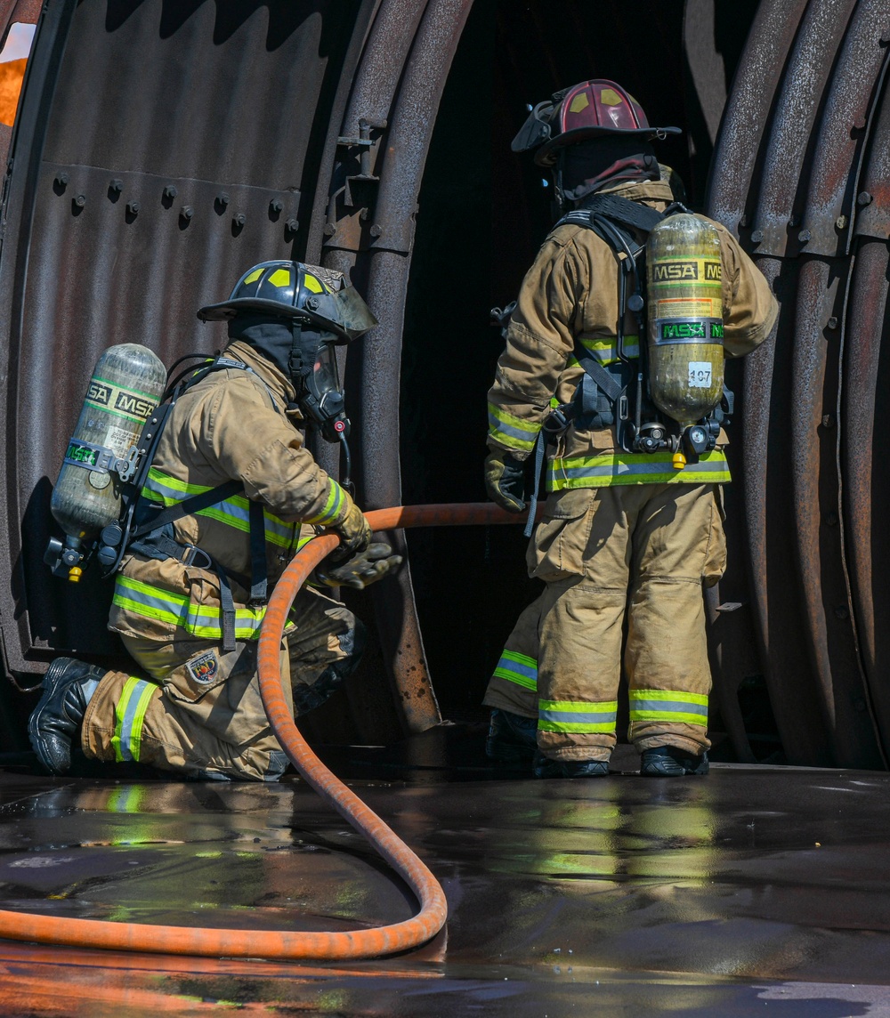 Collaboration builds comradery: Total Force, community firefighters train at Dover