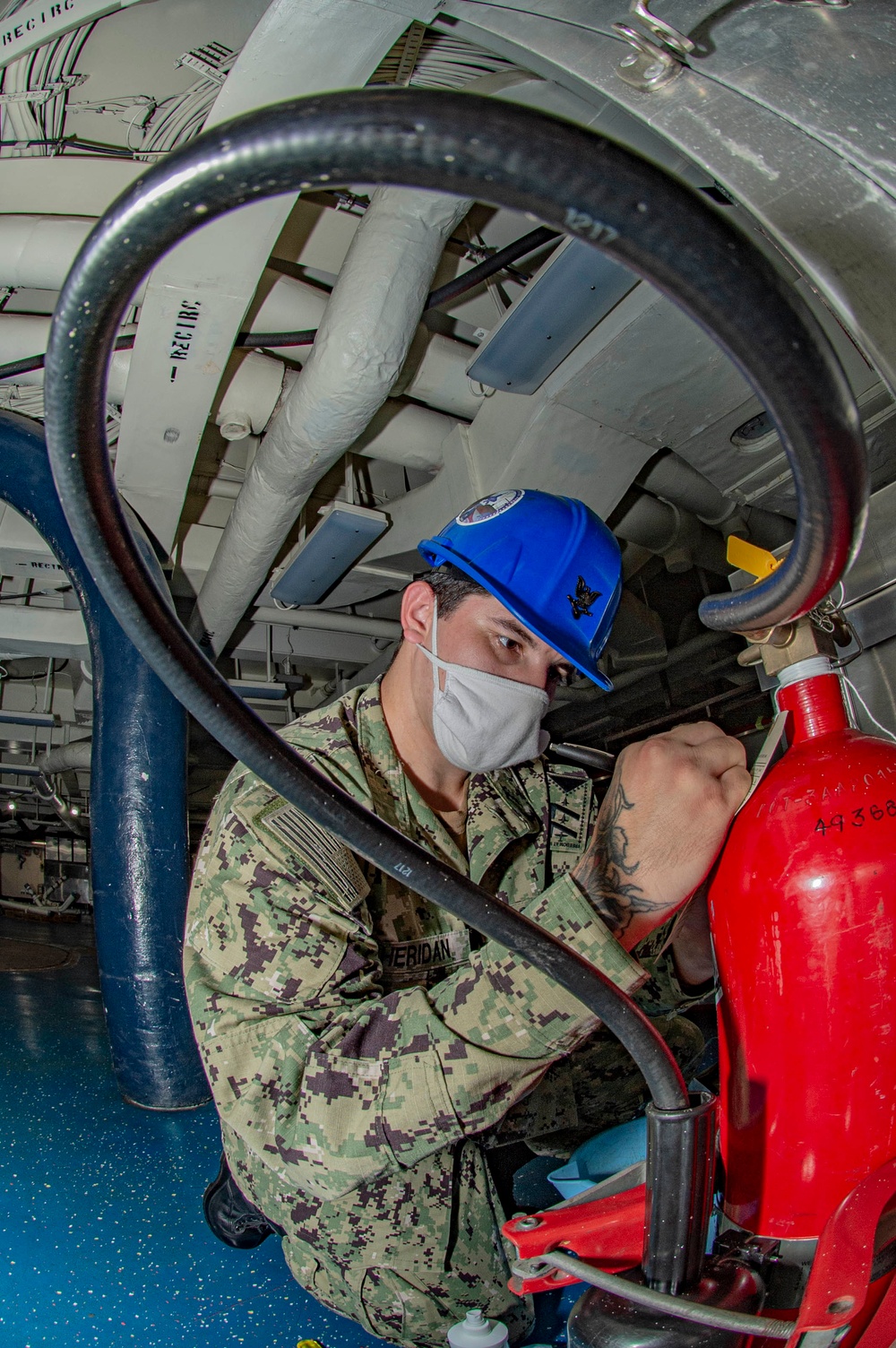GHWB Sailor Conducts Maintenance