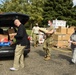 Members from the 110th Wing Battle Creek work with the Food Bank of South Michigan