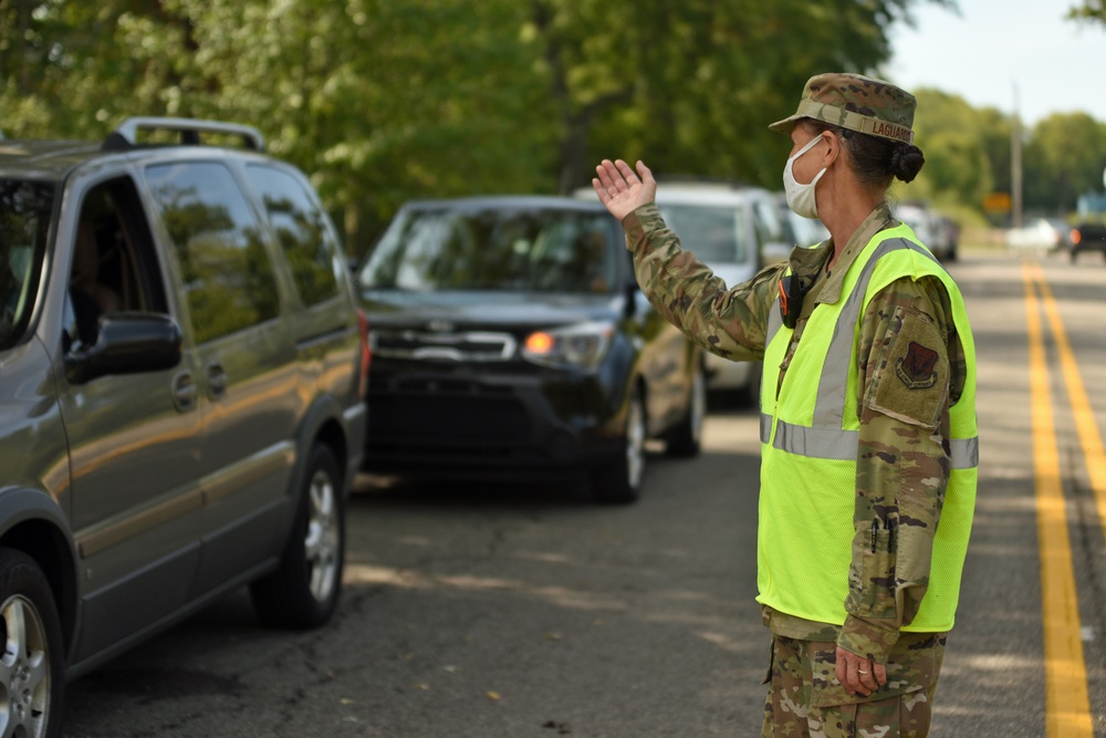 Members from the 110th Wing Battle Creek work with the Food Bank of South Michigan