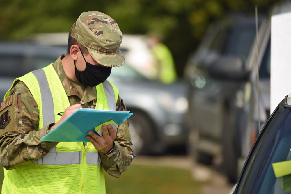 Members from the 110th Wing Battle Creek work with the Food Bank of South Michigan