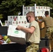 Members from the 110th Wing Battle Creek work with the Food Bank of South Michigan