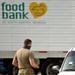 Members from the 110th Wing Battle Creek work with the Food Bank of South Michigan