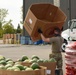 Members from the 110th Wing Battle Creek work with the Food Bank of South Michigan