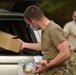 Members from the 110th Wing Battle Creek work with the Food Bank of South Michigan