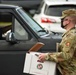 Members from the 110th Wing Battle Creek work with the Food Bank of South Michigan