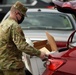 Members from the 110th Wing Battle Creek work with the Food Bank of South Michigan