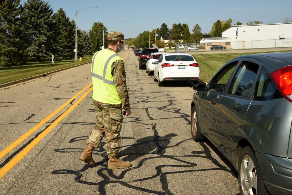 Members from the 110th Wing Battle Creek work with the Food Bank of South Michigan