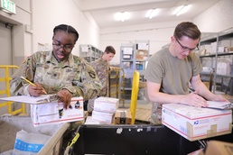 Illeshiem post office workers deliver mail, morale