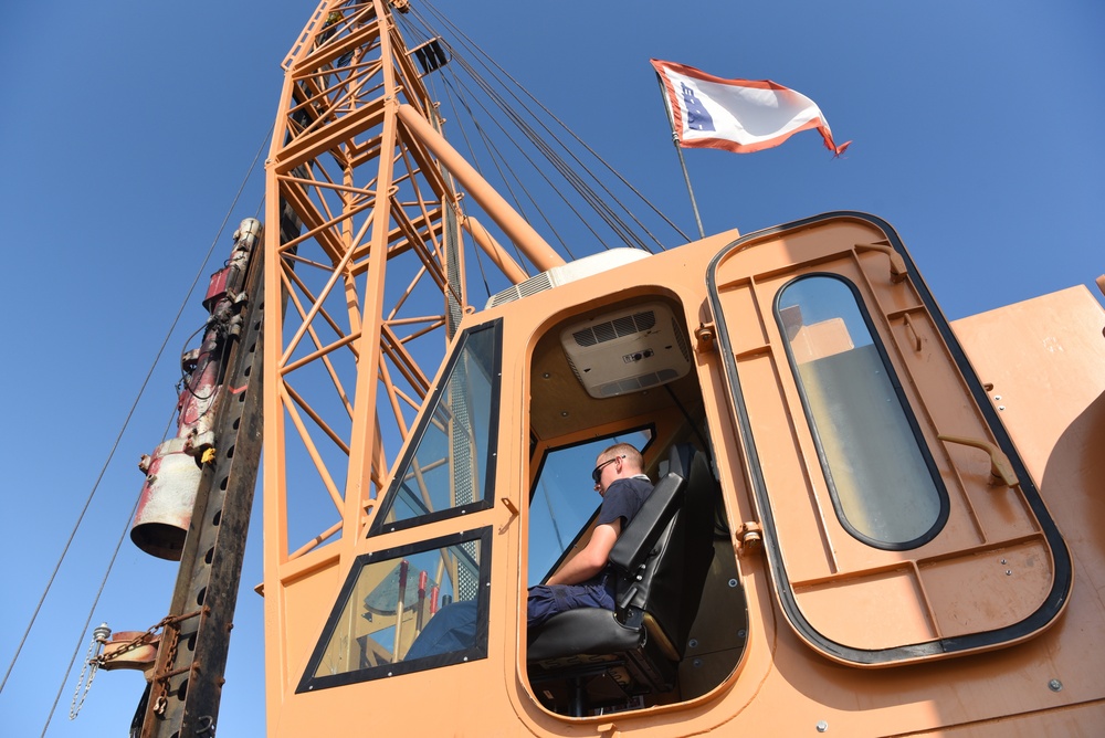 Coast Guard construction tender works in Sabine Pass post Hurricane Delta