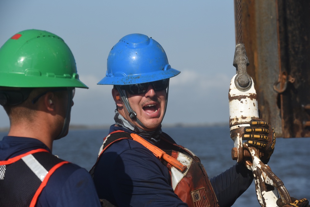 Coast Guard construction tender works in Sabine Pass post Hurricane Delta