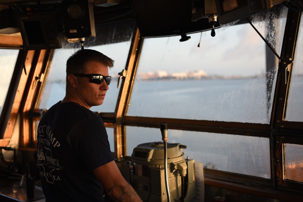 Coast Guard construction tender works in Sabine Pass post Hurricane Delta