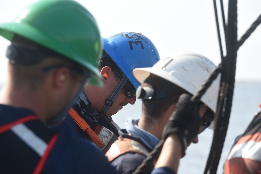 Coast Guard construction tender works in Sabine Pass post Hurricane Delta