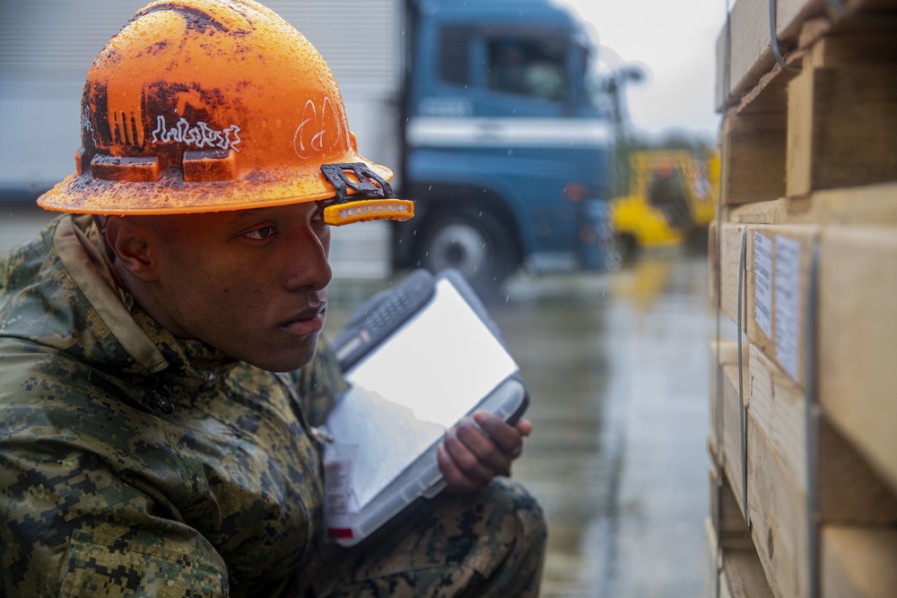 CATC Camp Fuji ASP Marines unload and inventory artillery rounds