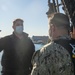 Logistic Specialist 1st Class David Kerley reenlists aboard the USS Constitution