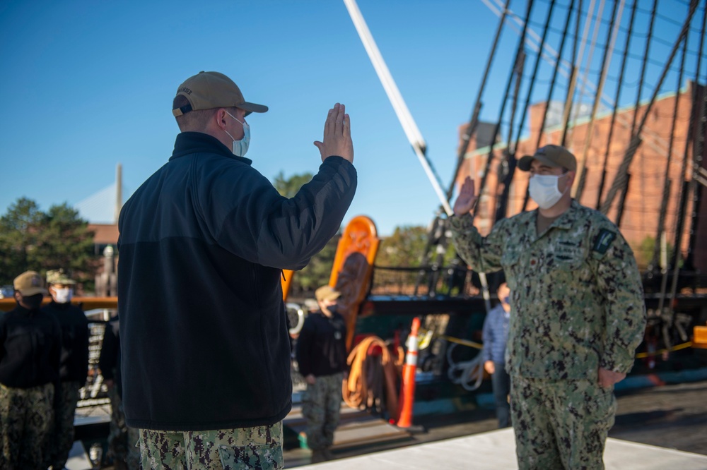 Logistic Specialist 1st Class David Kerley reenlists aboard the USS Constitution.