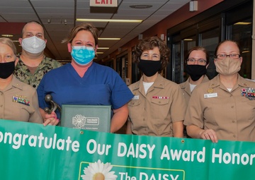 NMCP Nurses Present ICU Nurse with DAISY Award