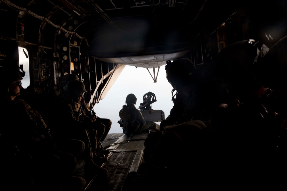 Sailors and Marines conduct a mass casualty evacuation