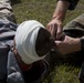 Sailors and Marines conduct a mass casualty evacuation